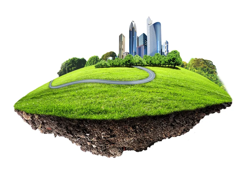 Image of a modern city surrounded by nature landscape